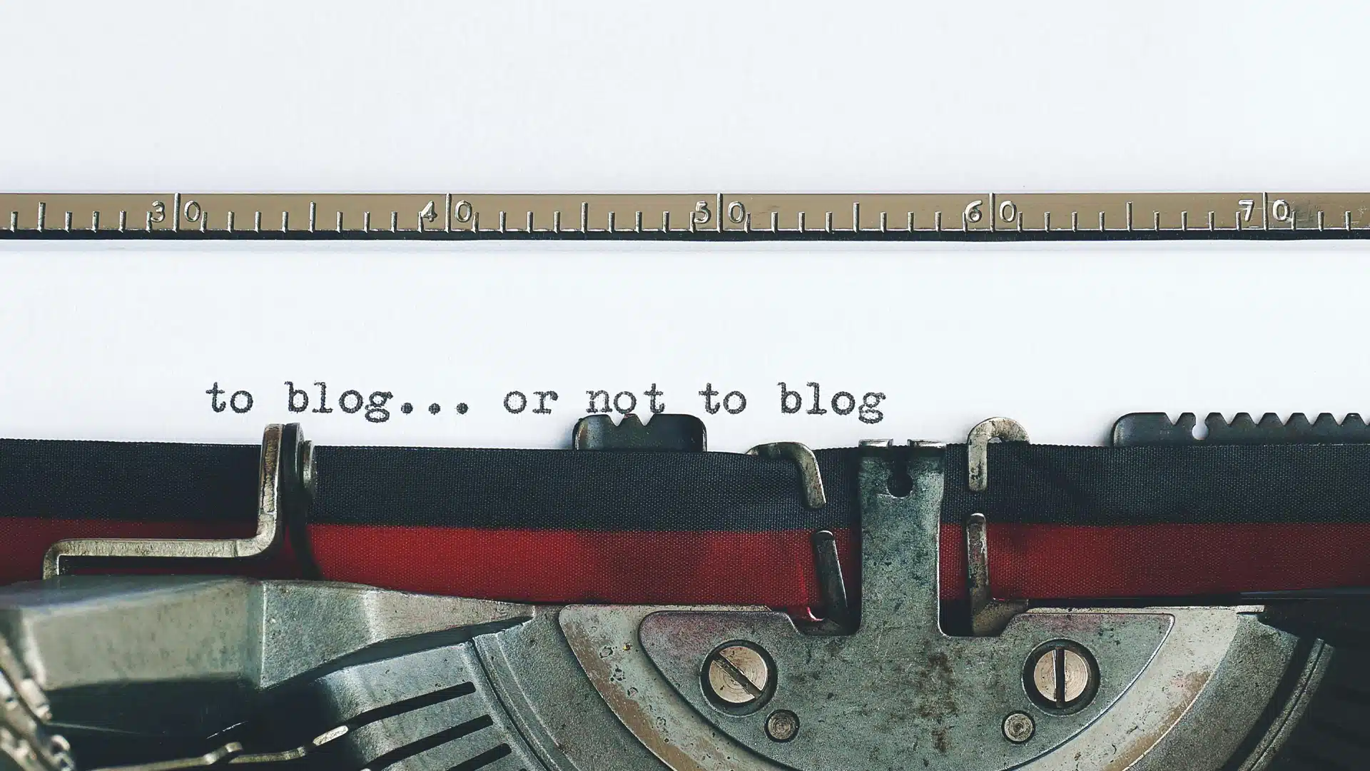 to blog or not to blog written on a typewriter